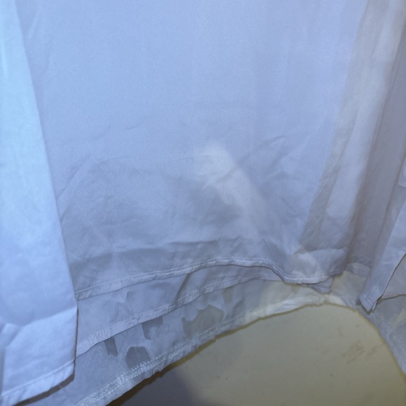 Zulily top in XXL has embossed flowers It’s  lining the sleeve are see-threw - Picture 3 of 15